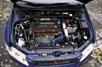 - Mitsubishi Lancer Evolution (  ).   