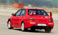 - Mitsubishi Lancer Evolution (  ).  