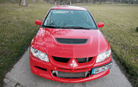 - Mitsubishi Lancer Evolution (  ).  