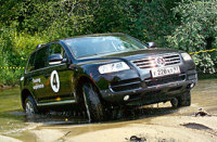 - Volkswagen Touareg ( ).   