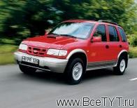   Kia Sportage ( ).  