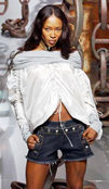 British super model Naomi Campbell wears a creation as part of Dolce & Gabbana Spring/Summer women\\'s collection for 2003