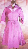 This is an awesome early 1950\'s rose and brown stripe taffeta robe that is quilted